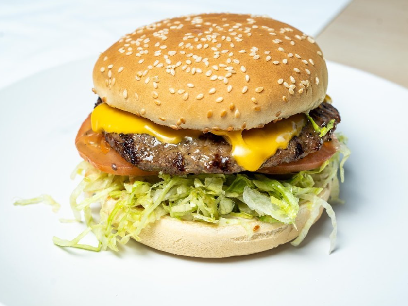 Cheeseburger on a white plate