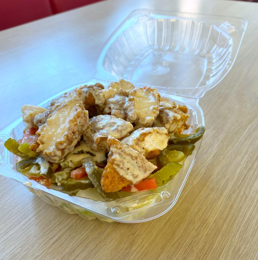 Falafel salad in a takeout container